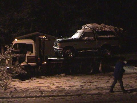 1994 Ford Explorer - Tim's Bronco up on the flatbed, ready to head home after a long, cold, wet day for all of us.