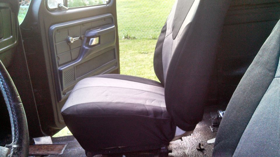 1979 Ford Bronco interior showing driver's seat and door panel