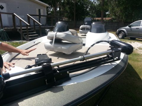 2003 Tracker Tournament - Interior view of a boat with a trolling motor and seats visible.