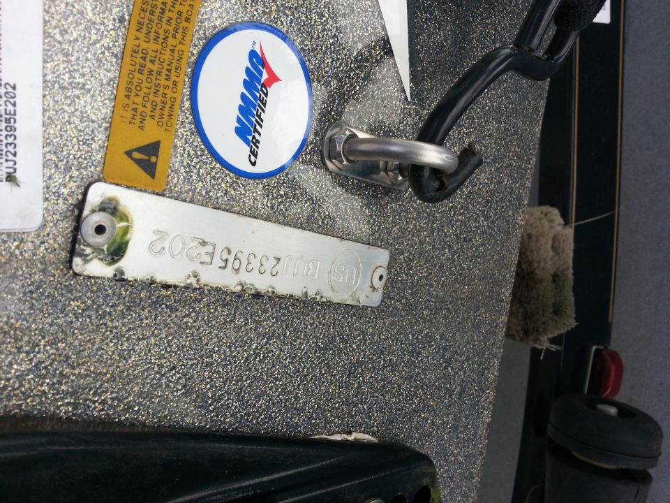 Boat hull with NMMA certified sticker and VIN plate