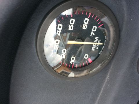 2003 Tracker Tournament - A close-up of a boat's tachometer gauge shows RPM readings from 0 to 70.