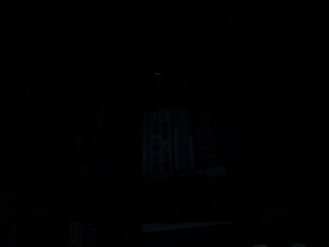 2003 Tracker Tournament - A nighttime scene shows a building with lights and a small object in the sky.