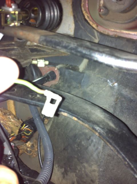 1995 Ford Mustang - Close-up of the brake light switch wiring harness in a 1995 Ford Mustang.