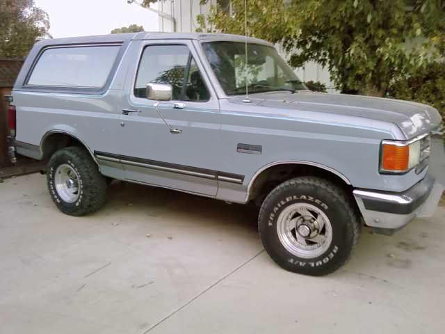 1994 Ford Bronco parked on concrete driveway