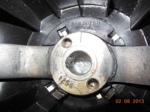 1979 Ford F-150 - Close-up view of a steering wheel hub showing stamped part numbers and splines for attachment.