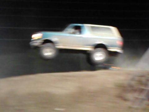 1996 Ford Bronco - Jumping my truck at Trucks on the Track back before I lifted it. Still drove fine