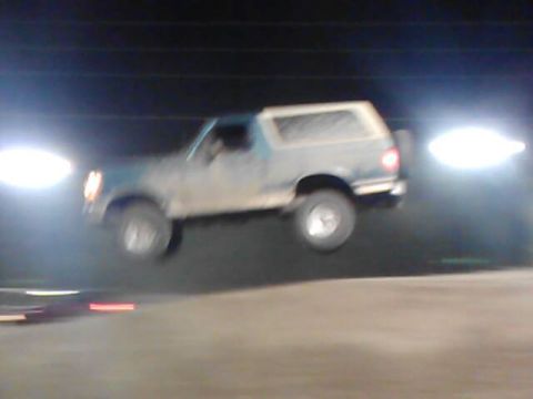 1996 Ford Bronco - Jumping my truck at Trucks on the Track back before I lifted it. Still drove fine