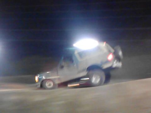 1996 Ford Bronco - Jumping my truck at Trucks on the Track back before I lifted it. Still drove fine