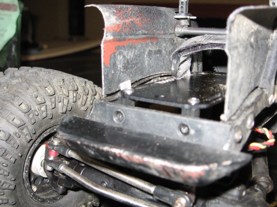 RC car chassis with tire and suspension detail