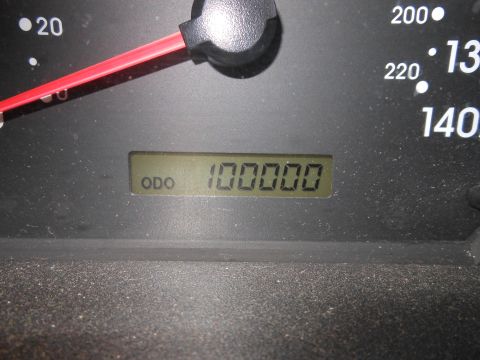 1996 Ford F-150 - The odometer displays a reading of 100,000 miles, indicating significant usage.