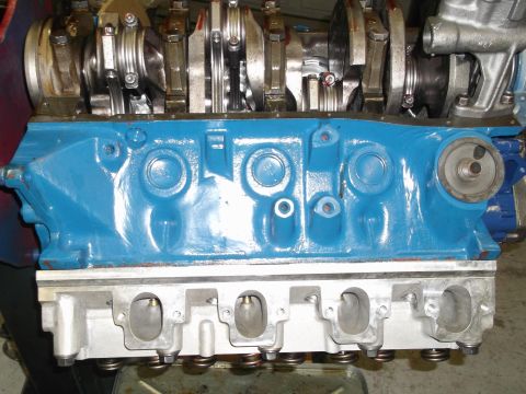1970 Ford Mustang - Close-up view of an engine block and crankshaft assembly.