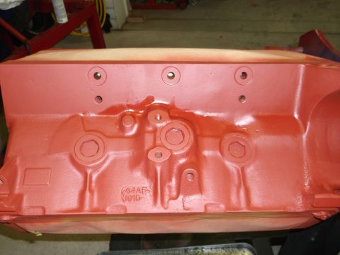 1964 Ford Galaxie - A red engine block with cast numbers visible on its side.