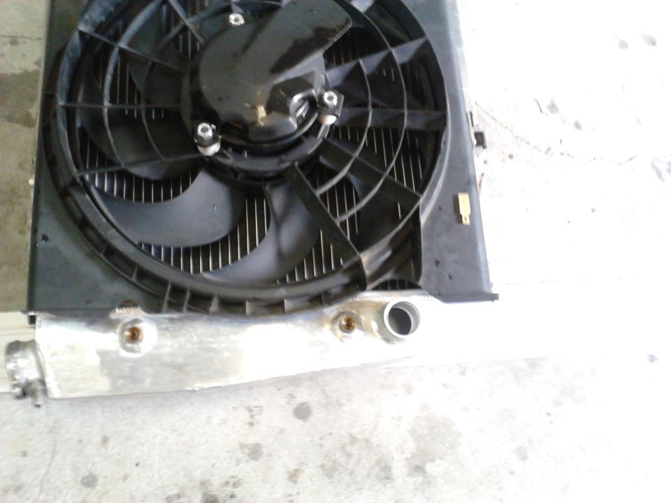 Pic shows where factory shroud was clearance for trans cooler lines and lower rad outlet.