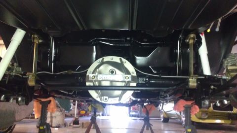 1972 Pontiac Trans Am - A close-up view of a vehicle's undercarriage, highlighting a polished differential cover.