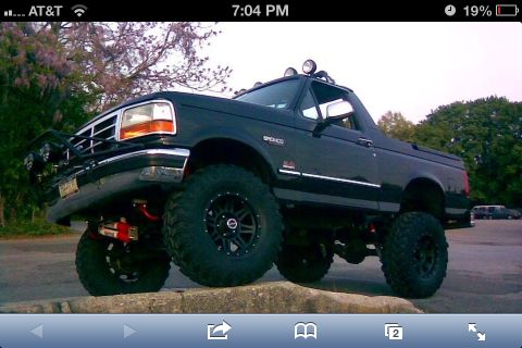 1995 Ford Bronco - This modified 1995 Ford Bronco features large off-road tires and a raised suspension system.