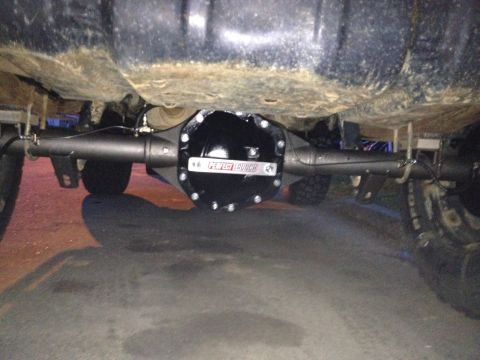 1995 Ford Bronco - Close-up of a rear differential a black 'Perfect Clutch' cover.