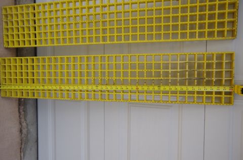 1983 Ferrari Enzo - Yellow plastic grates are shown with a tape measure to indicate their size.