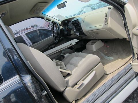 1991 Ford LTD Crown Victoria - Interior view of a car, with another vehicle visible through the window.
