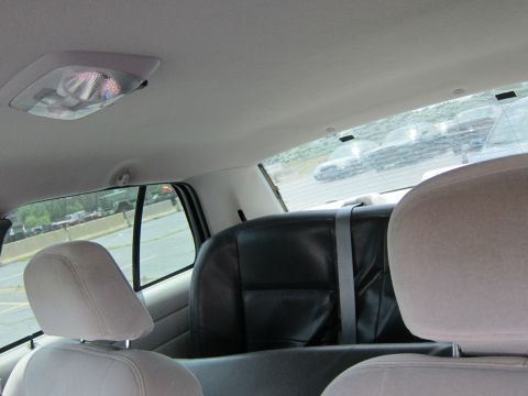 1991 Ford LTD Crown Victoria - Rear interior view of a 1991 Ford Crown Victoria LTD, showing the back seat and headrests.