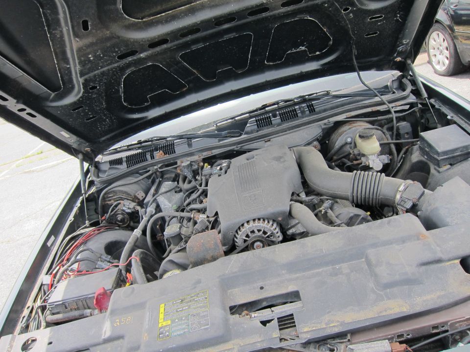 1991 Ford Crown Victoria LTD engine bay with hood open, showing engine components and wiring