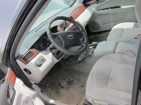 1991 Ford LTD Crown Victoria - Interior view of a car showing the dashboard, steering wheel, and front seats.