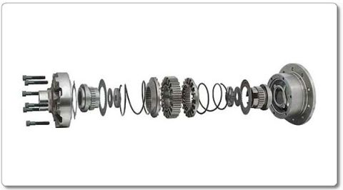 1995 Ford Bronco - Exploded parts breakdown of a limited-slip differential carrier showing the gears, clutch plates, springs and case components laid out in a…