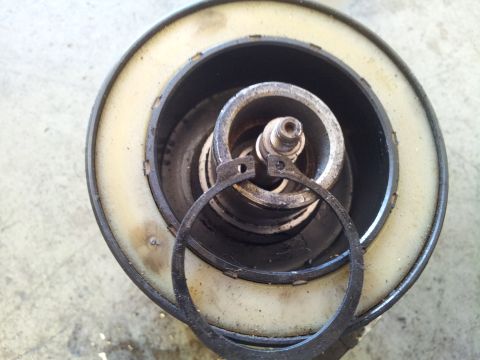 2005 Chevrolet Venture - A disassembled automotive component, likely part of a suspension or similar system, is shown with its internal parts exposed.