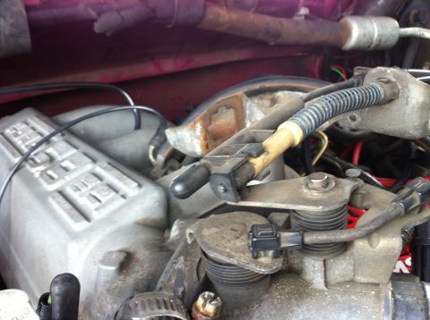 1992 Ford F-150 - Remove the cover for the throttle cable assuming it is still there and disconnect the throttle/cruise cable. It pops off of a little ball.…