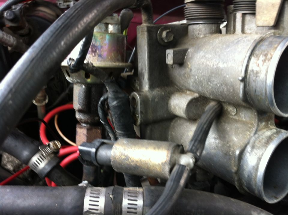 Disconnect the rubber hose running to the throttle body from this solenoid. I cannot remember its name. While you are there disconnect the coolant lines running to the throttle body. There should be two. One at the top from the radiator and one at the bottom from the thermostat housing (I think). Also unbolt the EGR from the throttle body. You can unbolt it from the exhaust manifold, but you might run into issues there.