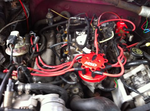 1992 Ford F-150 - As you can see I plugged all of the intake holes with paper towel's so I could scrape the old gasket off and not drop anything in it. I als…
