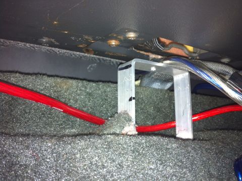1992 Ford F-150 - This is all it took to stop the rear seat from collapsing when folded down. I am 6'1" and 260lb and it can hold me.