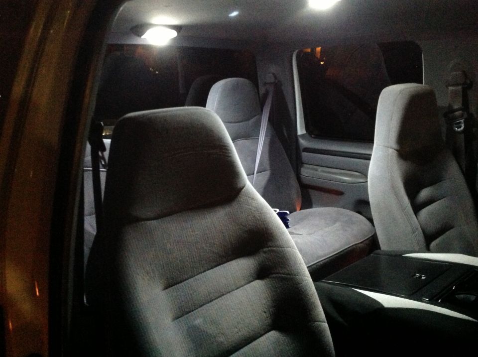 Interior view of 1997 Ford F-350 showing front seats and door panel