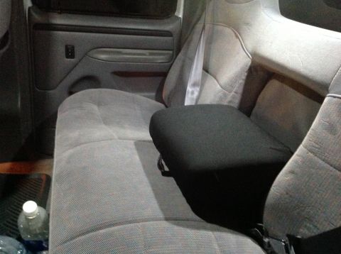 1997 Ford F-350 - Interior view of a 1997 Ford F-350, focusing on the front seating area and door panel.