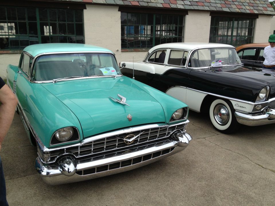 Turquoise and white 1955 Packard Clipper front 3/4 view