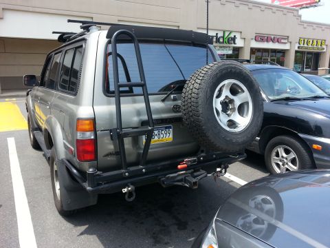 1987 Toyota 4Runner - This Toyota Land Cruiser, likely from the early 1990s, is parked in a lot with other vehicles.