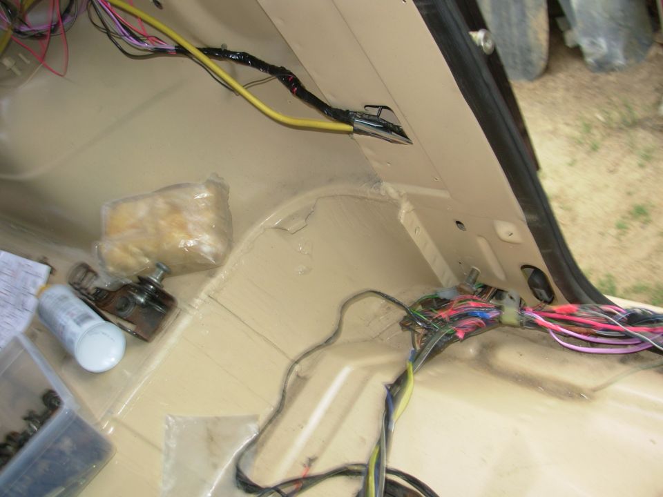 There's a new connector at the base of the B-pillar for the circuits going to the rear cargo area switches.