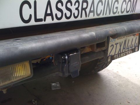 1990 Ford Bronco - Rear bumper with a trailer hitch and California plate 2TXA444, below a CLASS3RACING.COM windshield decal.
