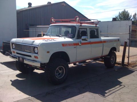 1968 Ford Mustang - This lifted International Harvester pickup truck features "OFF ROAD" graphics and a prominent roof rack with auxiliary lights.