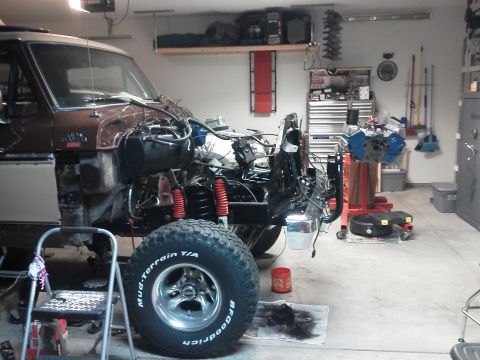1979 Ford F-150 - 1979 Ford F-150 undergoing engine rebuild and swap in a garage setting.