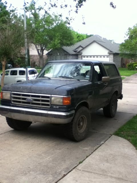 1988 Ford Bronco - This 1987 Ford Bronco is seen parked in a suburban driveway.