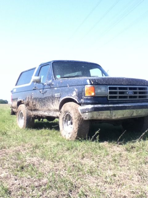 1988 Ford Bronco - This Ford Bronco is covered in mud after being driven off-road.