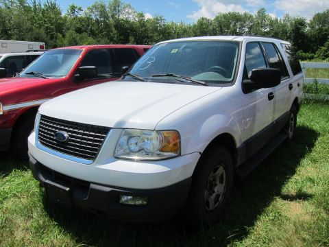 2001 Ford Crown Victoria - Front view of a white Ford Expedition SUV parked outdoors.