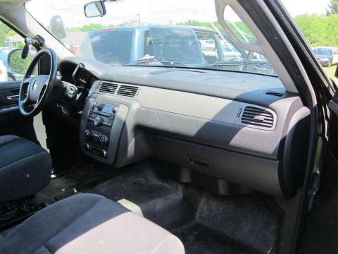 2001 Ford Crown Victoria - The interior of a vehicle is shown, with other vehicles visible through the windows.