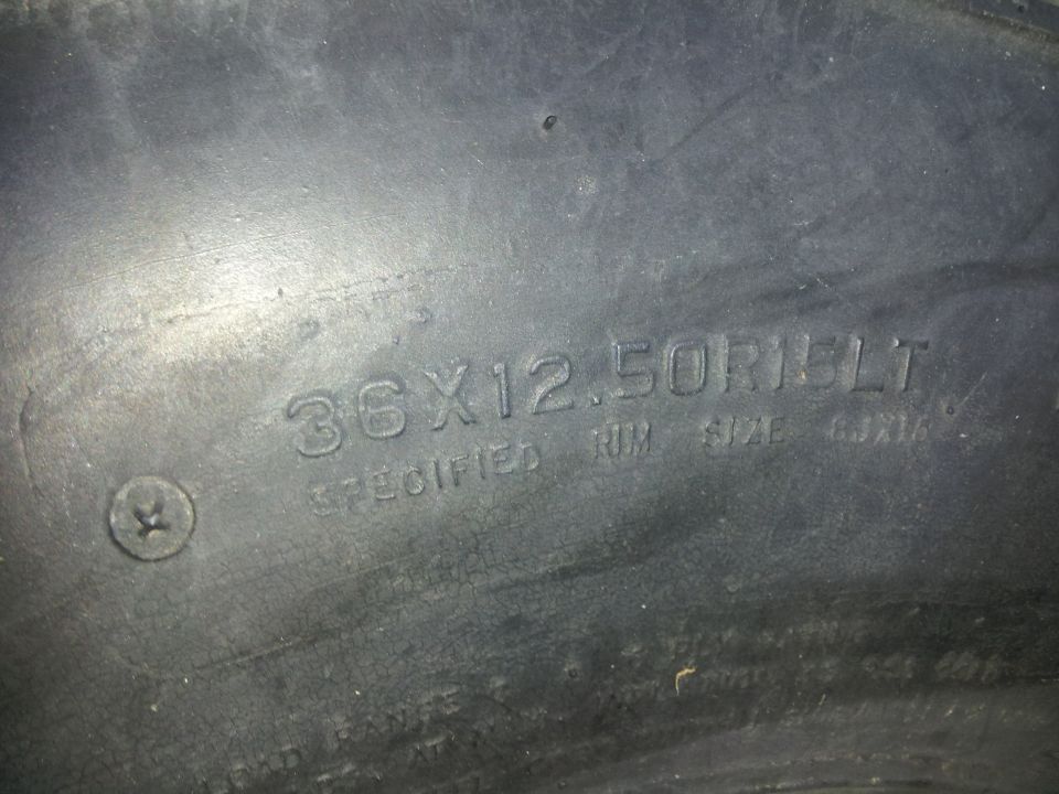 Tire sidewall text showing 36x12.50R17LT and specified rim size 8.5x17