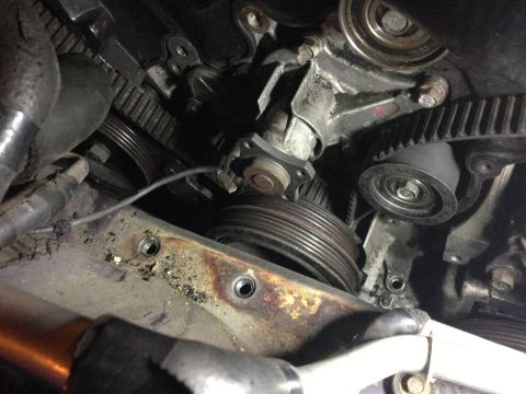 1996 Ford Probe - This image shows the internal engine components, focusing on the timing belt and associated parts.