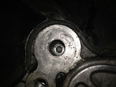 1996 Ford Probe - Detail of an engine timing belt cover, showing mechanical components and a gasket seal.