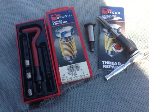 1996 Ford Probe - Recoil thread repair kit for M10-1.25 size fasteners shown with tools.