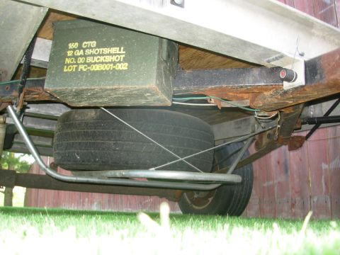 2004 Land Rover Land Rover - Cables on the front of the spare tray will keep it from sagging, or the spare from sliding too far forward, and they fall out of the way wh…