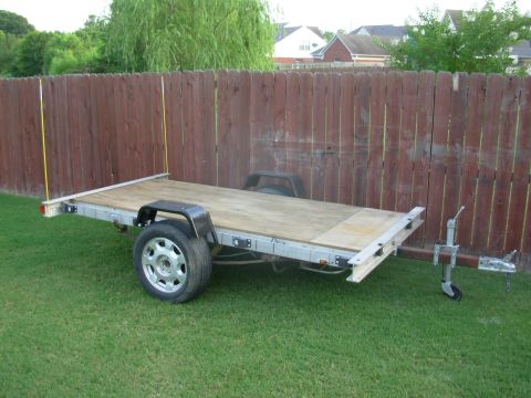 2004 Land Rover Land Rover - These little wheel covers should be enough to keep me legal, and they're just strong enough for me to sit on, though I don't plan to ever p…