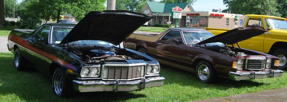 1975 Ford Ranchero, front view, black with orange stripe